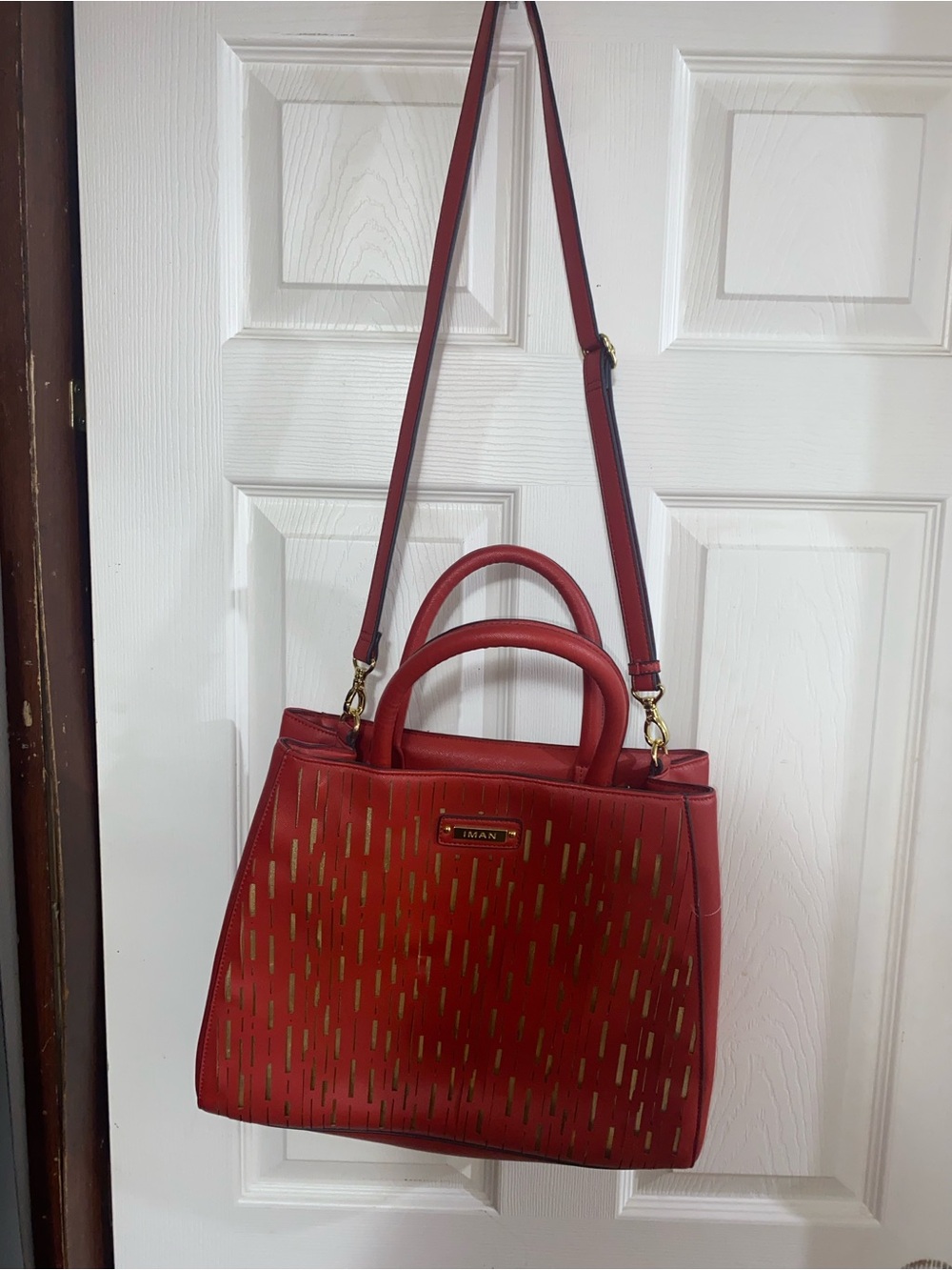 IMAN Red Satchel with Gold Accent Cutouts